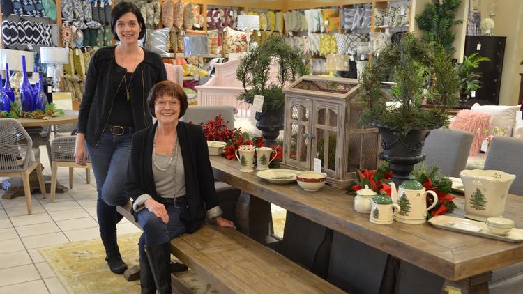 Beth Phillips and her daughter Robyn inside the Furnishing Hope store in Westcliff Plaza