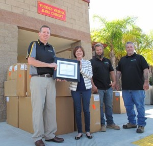 HD Supply team and Furnishing Hope's Beth Phillips with donated goods at Camp Pendleton